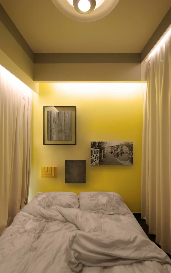 raumtrenner kleine wohnung schlafzimmer gelbe wand lange gardinen