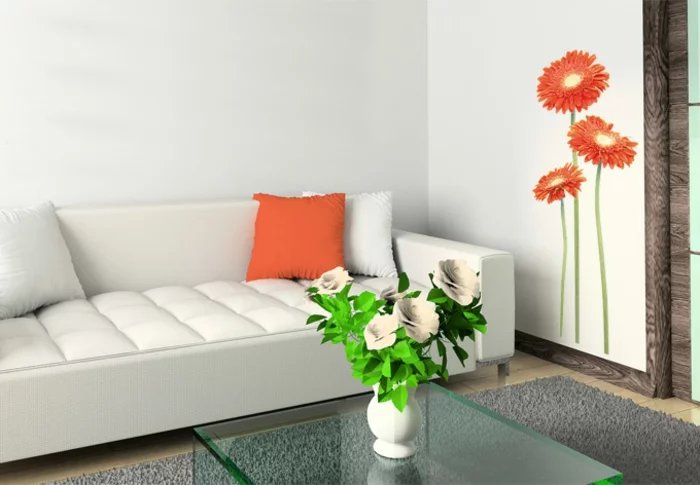 wandtattoos wohnzimmer orange gerbera weißes sofa