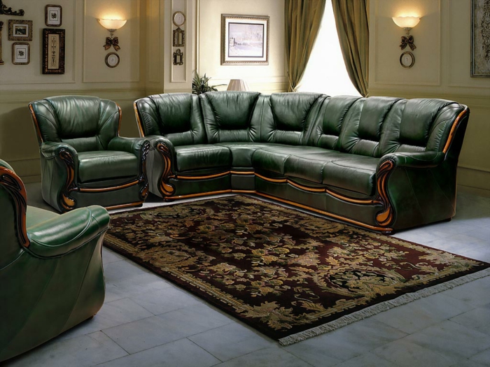 wohnzimmereinrichtung grünes ledersofa eleganter teppich