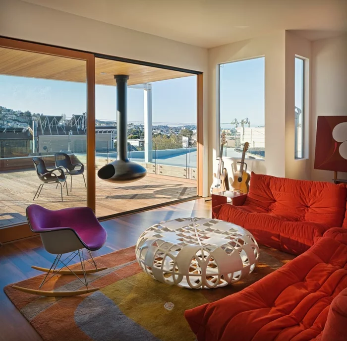 schaukelstühle designs lila wohnzimmer einrichten orange sofas
