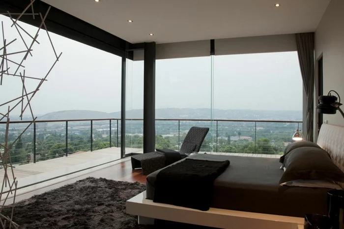 schlafzimmer einrichten ideen panoramafenster teppich