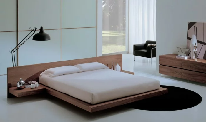 schlafzimmer einrichten ideen runder teppich elegante schlafzimmermöbel stehlampe