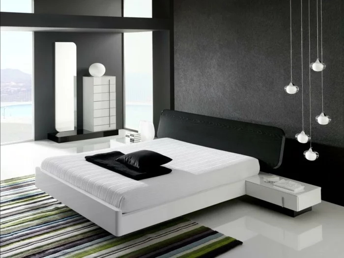 schlafzimmer ideen schwarz weißes schlafzimmer pendelleuchten und streifenteppich