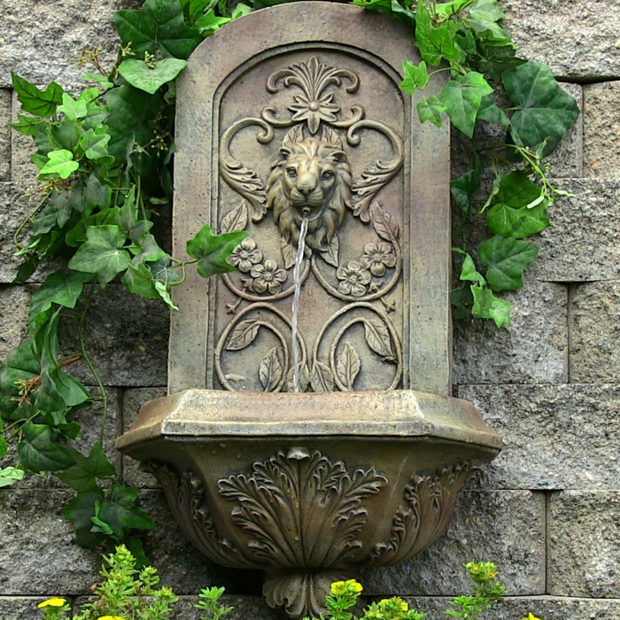 zierbrunnen dekorativ wandbrunnen romanisches design ornamente