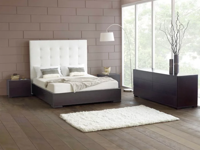betten design elegantes bettkopfteil weißer teppich holzboden