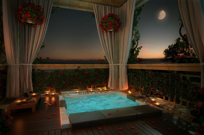 romantisch wohnen dekorieren badezimmer badewanne blumenblätter kerzen