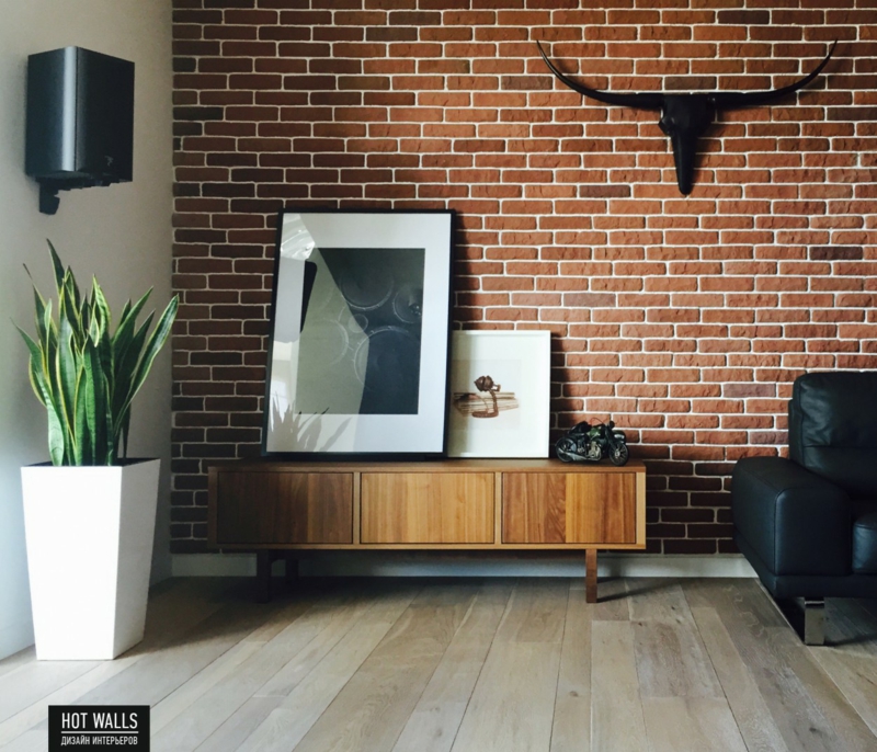 Designer Einrichtungstipps Wohnzimmer einrichten Beispile Backsteinwand