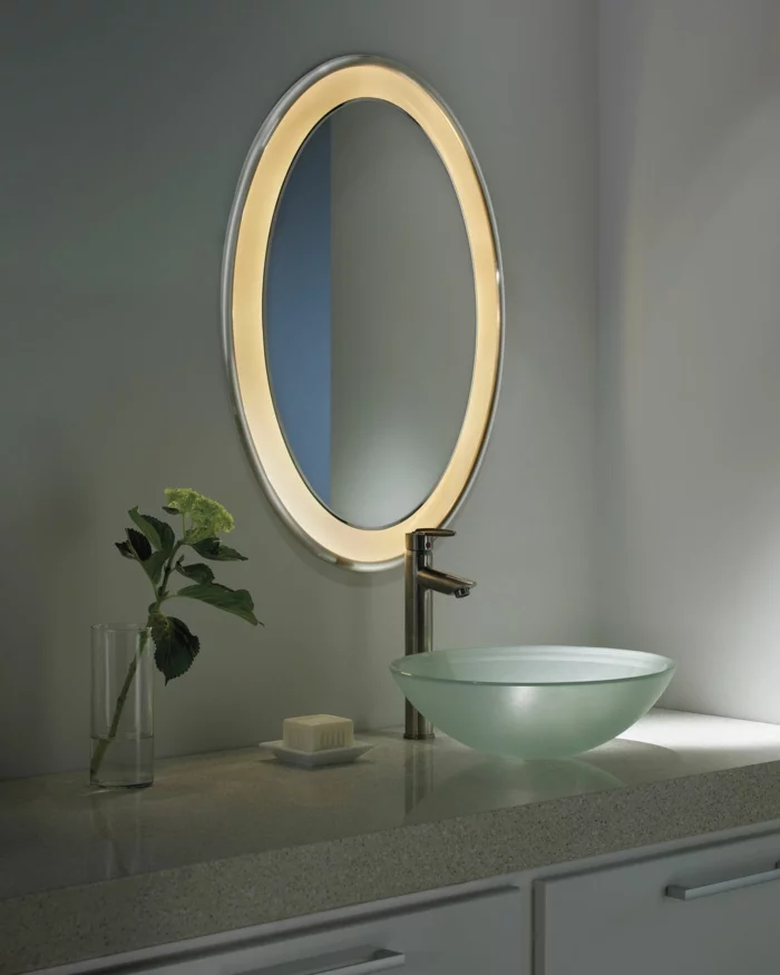 badezimmer gestalten ovaler badspiegel pflanzen modernes waschbecken