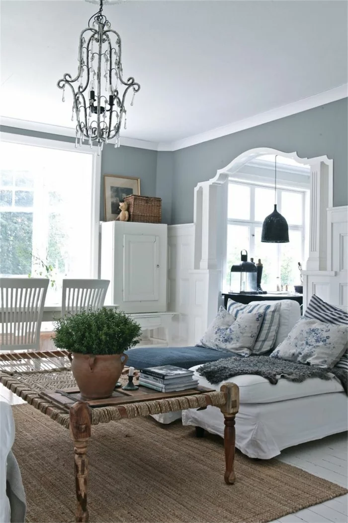 landhausstil wohnzimmer sisalteppich weißes ambiente schwedischer stil