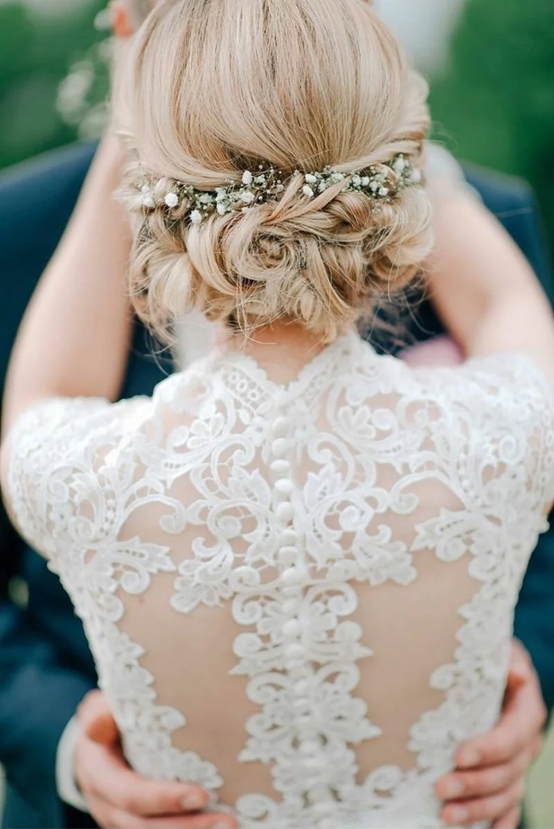 Hochzeitsfrisuren lange Haare Steckfrisur mit Blumen Haarschmuck