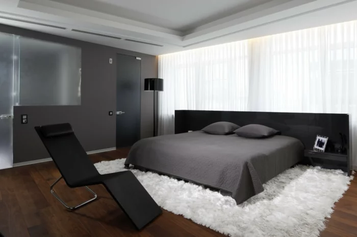 Schlafzimmergestaltung Wandfarbe grau Teppich