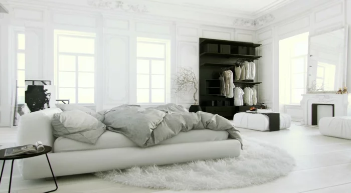 wandfarbe weiß wohnideen schlafzimmer runder teppich schwarzer kleiderschrank offen