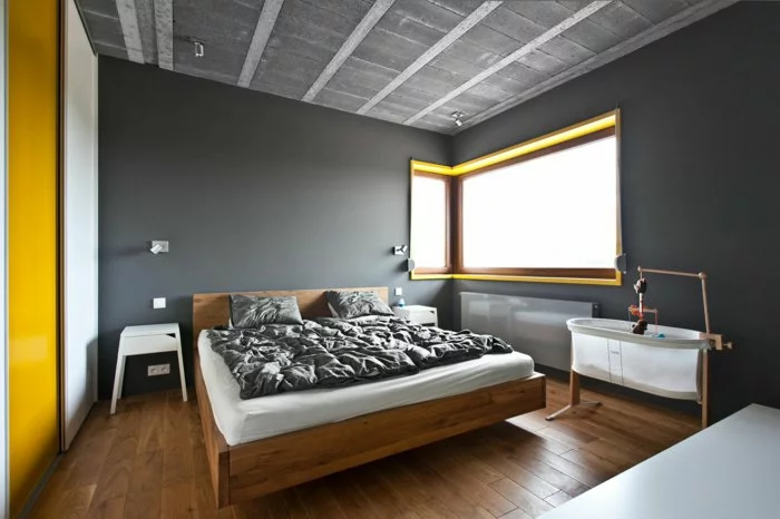 wohnideen schlafzimmergestaltung graue wandfarbe gelbe akzente