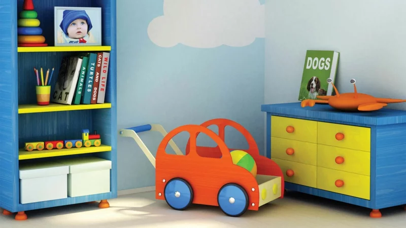 Kinderzimmer für Jungs bunte Kindermöbel und Kinderspielzeuge starke Akzentfarben Blau mt etwas Gelb und Orange 