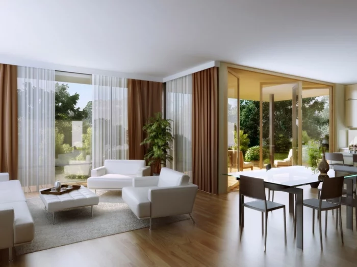 moderner Wohnbereich mit Laminatboden und weißen Möbelstücken