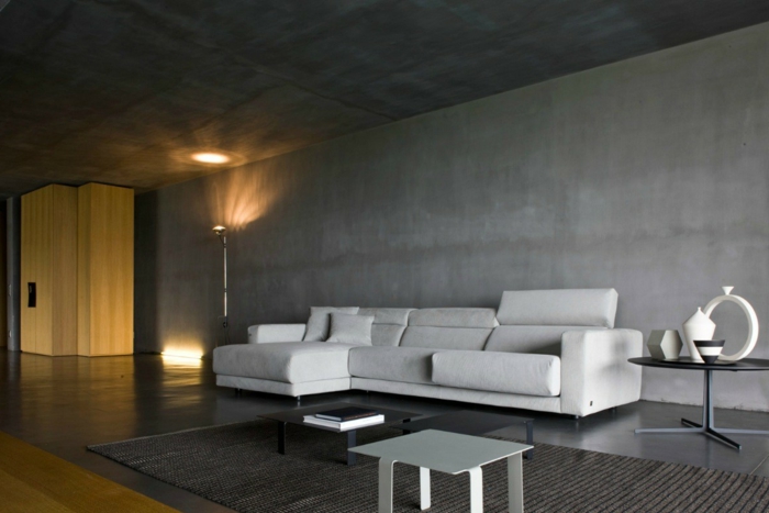 schöne wohnideen wohnzimmer geräumig betonoptik wandgestaltung teppich leuchten