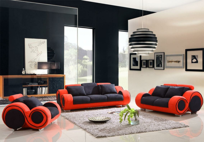 wandfarbe schwarz wohnzimmer einrichten möbel schwarz rot beiger teppich