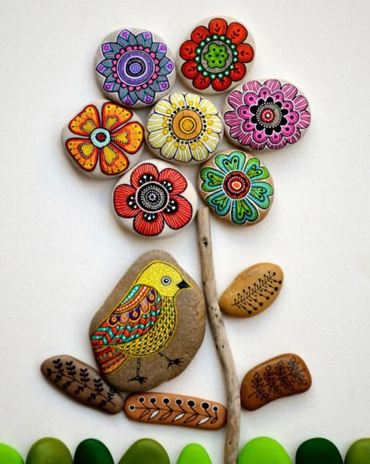 Steine bemalen farbige Blumenmuster Basteln mit Steinen kreative Ideen für Groß und Klein 