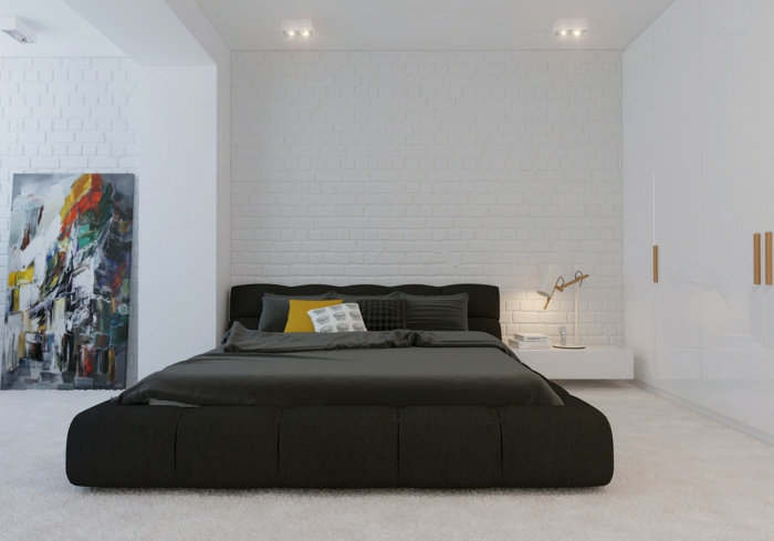 reduziertes wohnen doppelbett schlafzimmer weiße ziegelsteinwand
