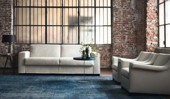 schöne wohnideen wohnzimmer blauer teppich helle möbel pflanze