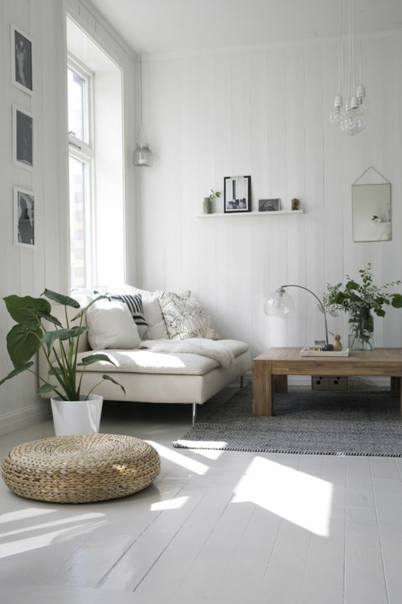 skandinavisch wohnen Einrichtungsbeispiele Wohnzimmermöbel Rattansitzkissen