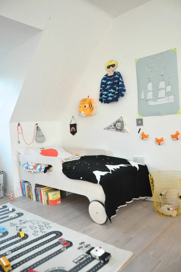 teppich kinderzimmer interaktiver kinderteppich weiße wände schwarze akzente