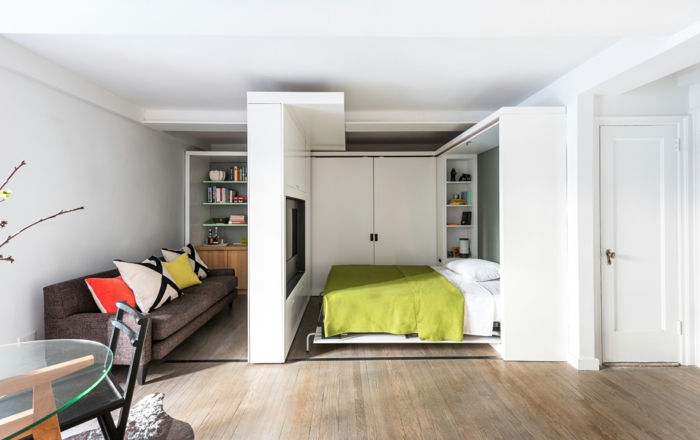 wohnraumgestaltung einzimmerwohnung schlafbereich sofa esstisch raumtrenner fernseher