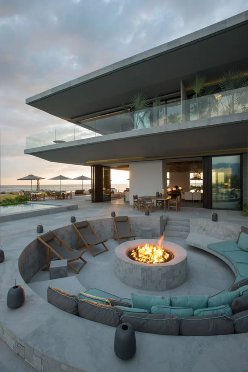 Feuerstelle bauen moderne Architektur Haus aus Beton minimalistischer Stil
