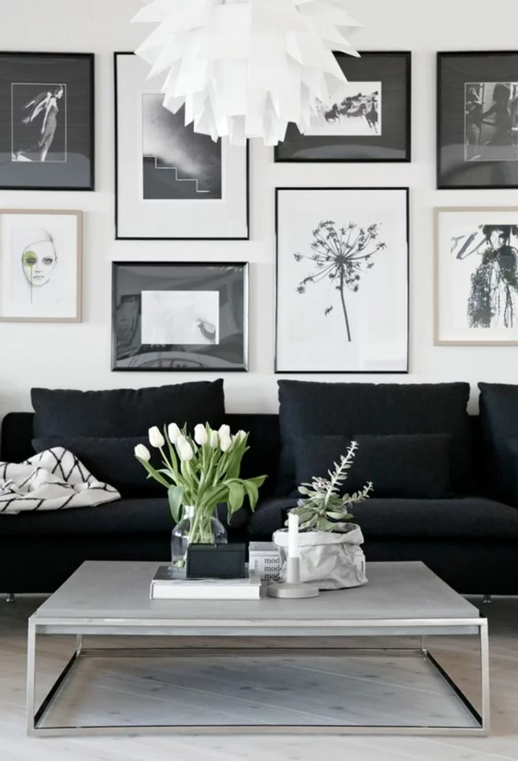 Fotowand Ideen in schwarz weiß stilvolle Wandgestaltung im Wohnzimmer 