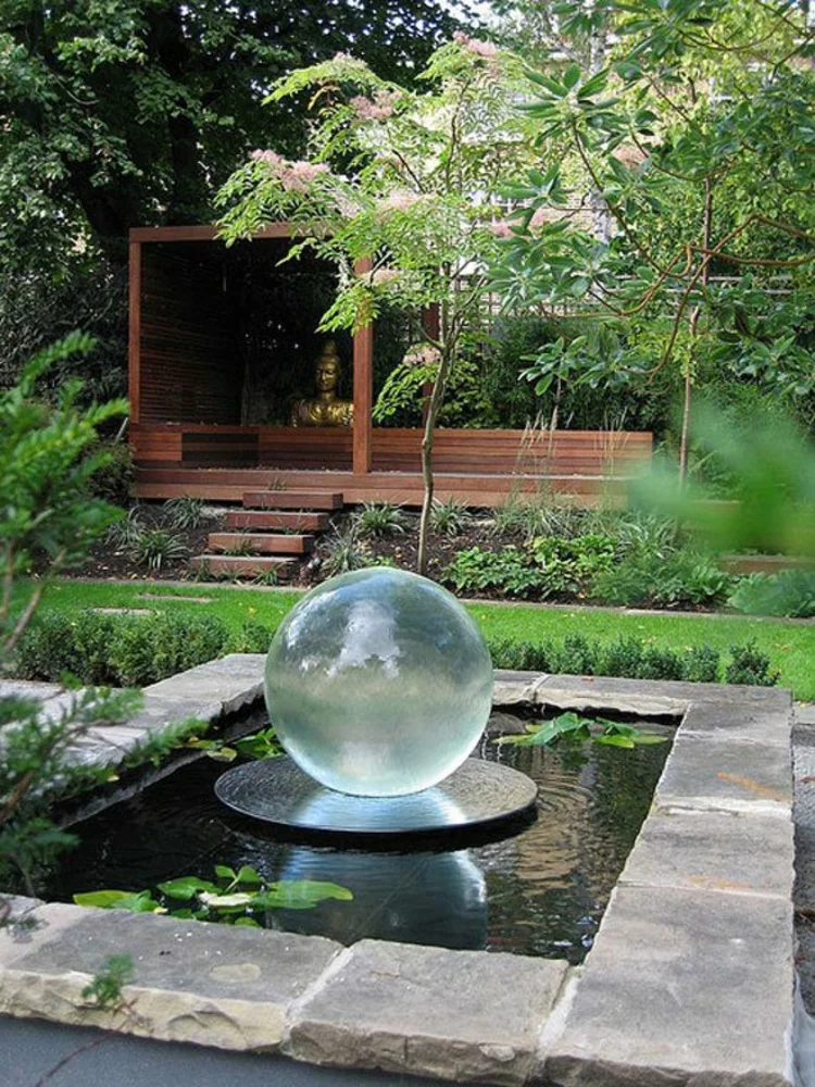 Gartenteich Bilder japanischer Garten Ideen aus Stein viel üppiges Grün 