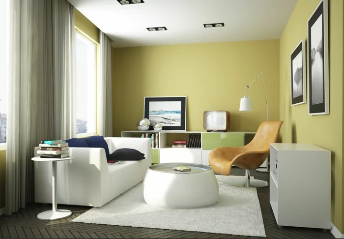 modernes wohnzimmer einrichten klein weißer teppich sessel grüne wandfarbe