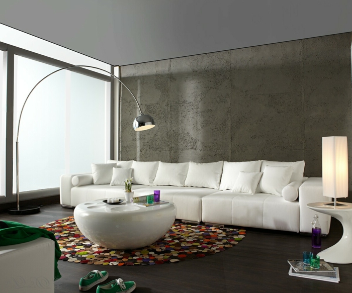 wohnzimmer modern einrichten runder teppich weißer couchtisch moderne beleuchtung