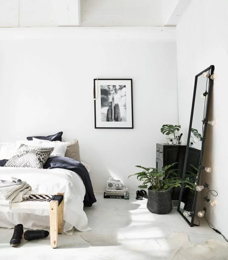 Wohnung einrichten Schlafzimmer Möbel Bett Wandspiegel Zimmerpflanzen