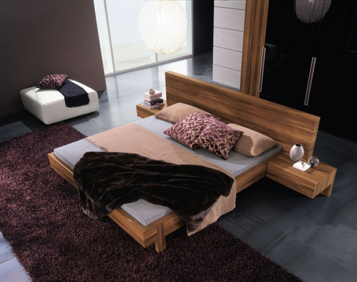 einrichtungsideen schlafzimmer funktionales bett teppich braune wände