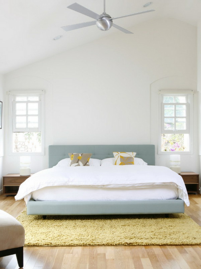 einrichtungsideen schlafzimmer schlicht hellgrüne akzente gelber teppich