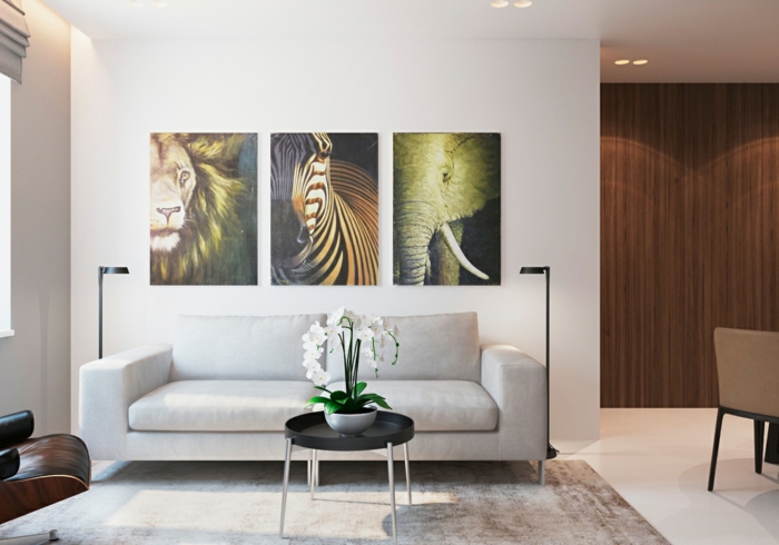 einrichtungsideen wohnzimmer wanddeko bilder eleganter teppich helle wände