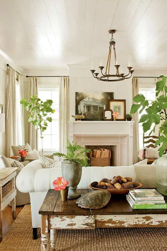 innenpflanzen wohnideen wohnzimmer weißes sofa rustikaler couchtisch