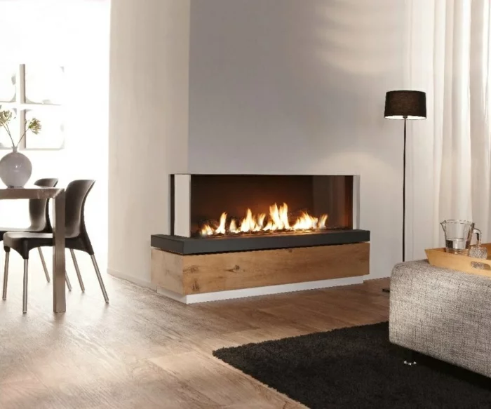 moderne feuerstellen minimalistisch wohnbereich schwarzer teppich