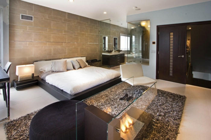 schlafzimmer einrichten beispiele moderne feuerstelle teppich akzentwand