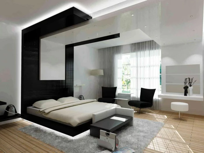 schlafzimmer einrichten beispiele schwarze akzentwand hinter bett grauer teppich