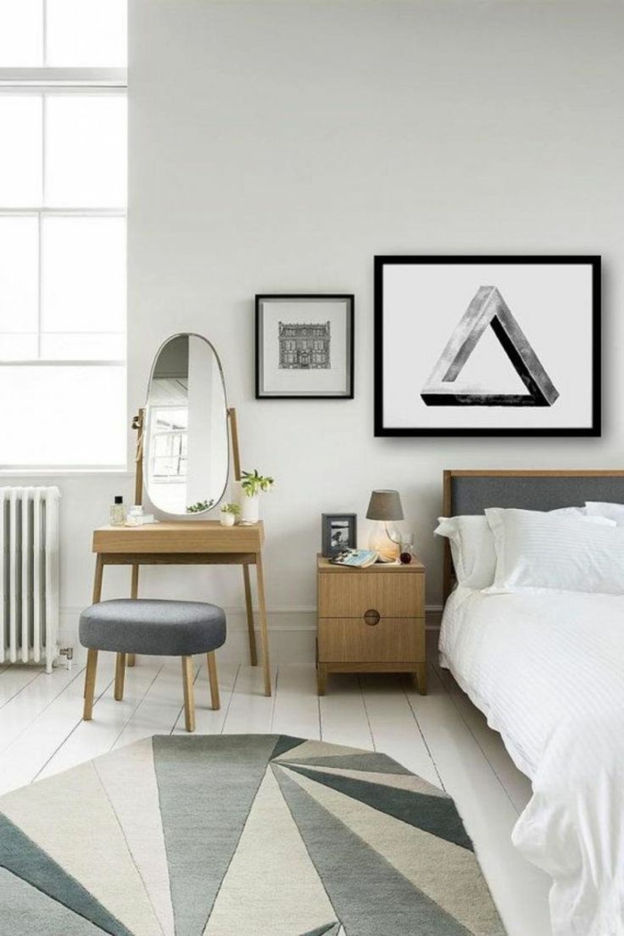schlafzimmer weiß geometrischer teppich weiße bettwäsche schminktisch