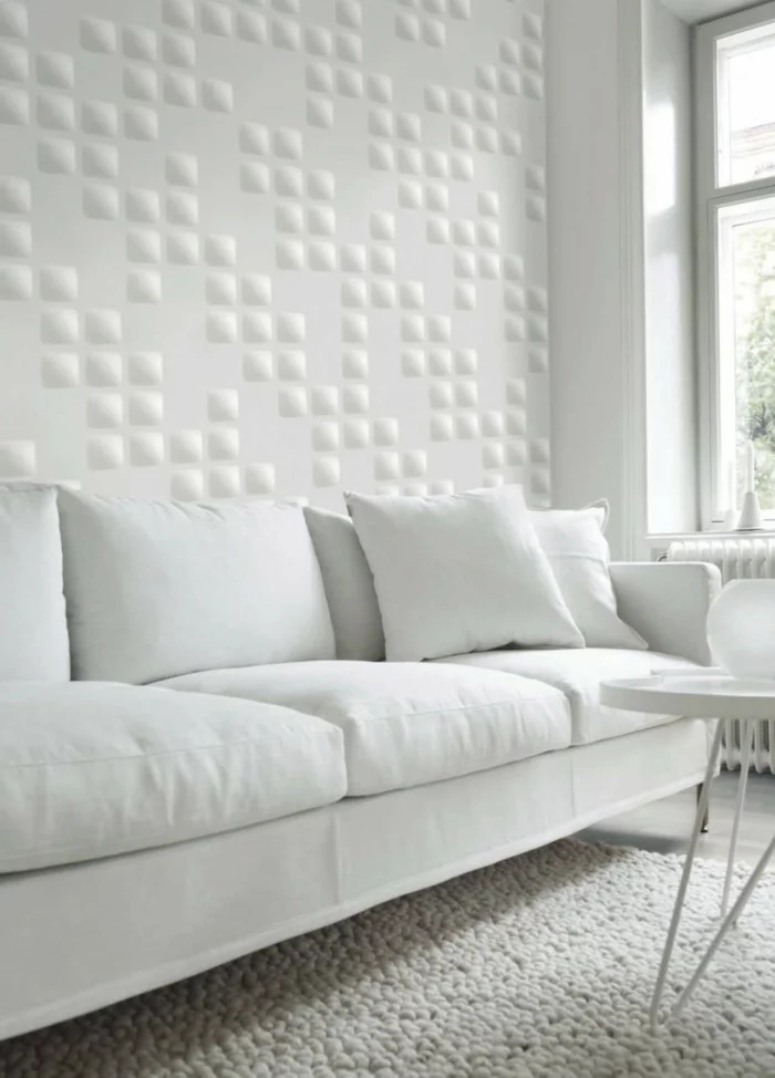 wohnzimmer wandgestaltung weiß wandpaneele mosaik weißes sofa