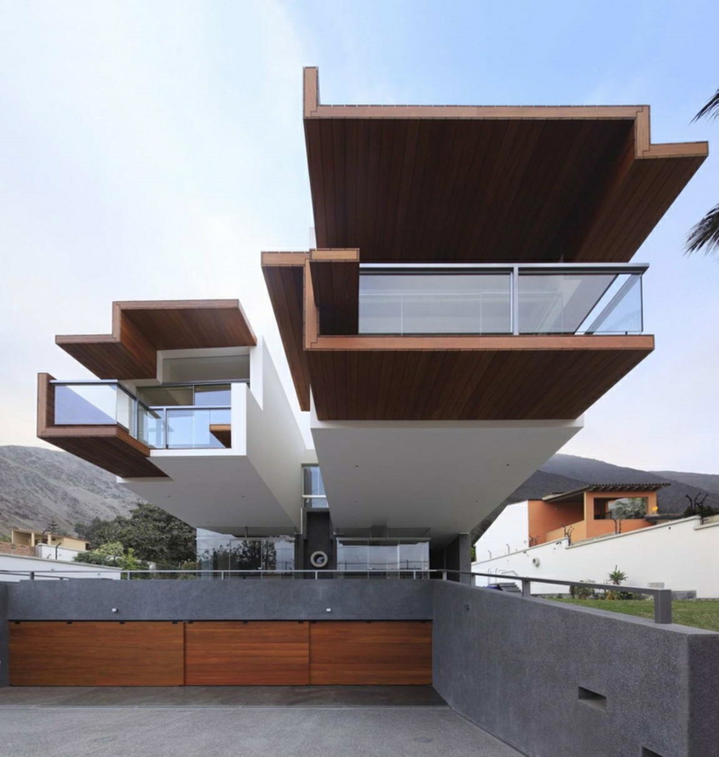 Moderne Architektur Häuser bauen Architektenhaus Hausfassade Holz Beton