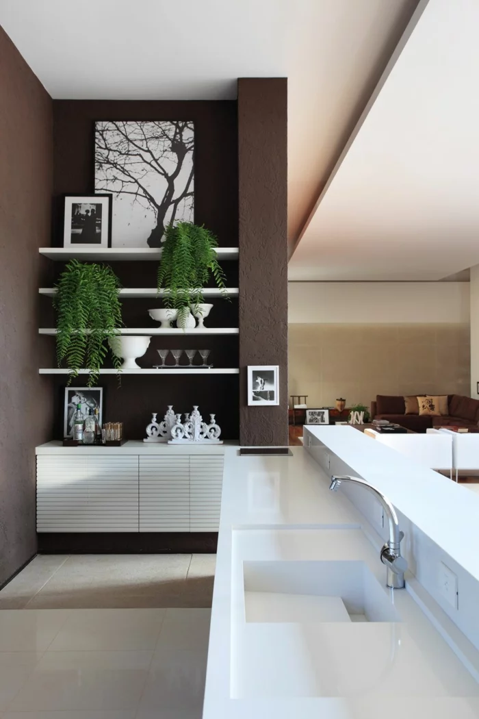 moderne küchen offener wohnplan wohnzimmer braune wände pflanzen