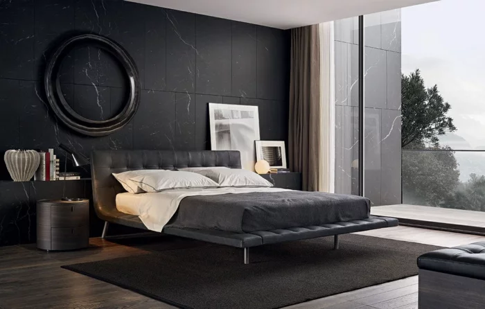 schlafzimmer einrichten schwarze akzentwand teppich wanddeko panoramafenster