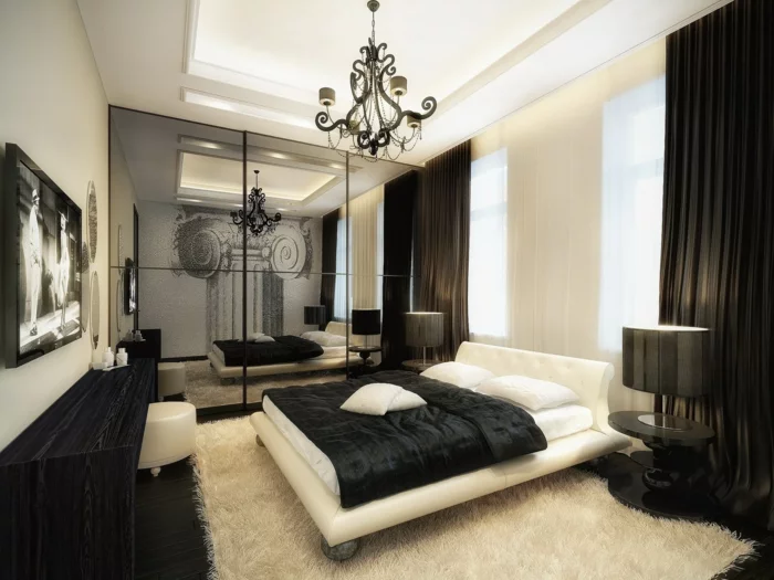 modernes Schlafzimmer mit langen schwarzen Gardinen und weißem Teppich