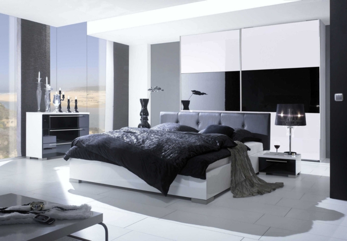 schlafzimmer schwarz weiß bodenfliesen panoramafenster dekoelemente