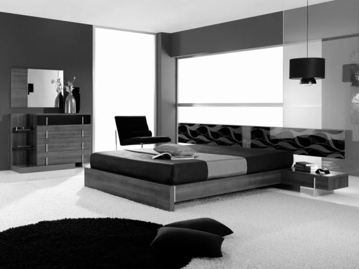 wohnideen schlafzimmer schwarz weiß dunkle wände heller teppich wandspiegel
