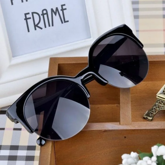 Designer Sonnenbrillen Damen Modetrends Accessoires schwarze Rahmen