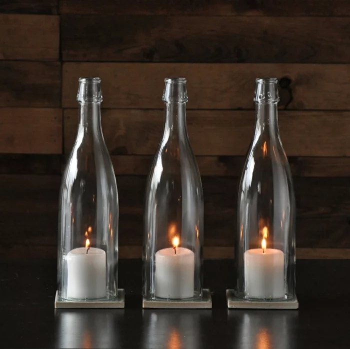 Deko Flaschen mit weißen Kerzen drinnen